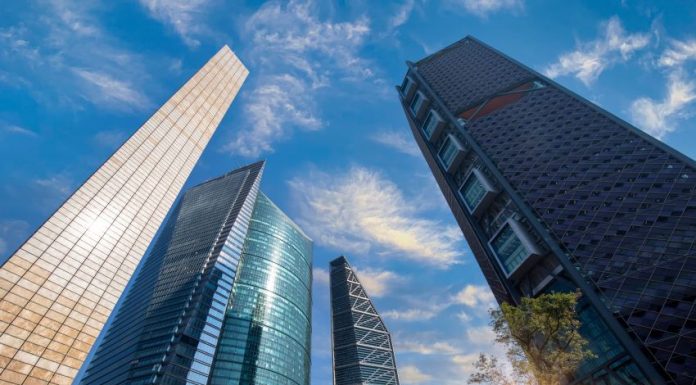 A cluster of skyscrapers climbing into a blue sky in Mexico's business district in Mexico City