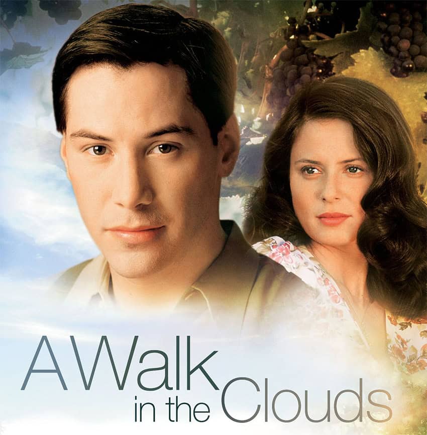 the movie poster for "A Walk in the Clouds," showing a man and woman looking into the distance