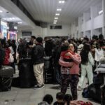 Mexicans wait for transport at the Tijuana Bus Terminal in December 2024