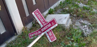 Knocked-down street signs in the México state neighborhood of Colonia 4T