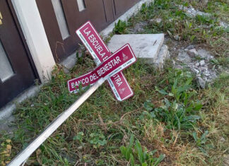 Knocked-down street signs in the México state neighborhood of Colonia 4T