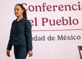 President Claudia Sheinbaum leaves the stage after her Monday morning press conference