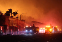 Firefighters battle the Palisades Fire, on the north side of Los Angeles, where Mexican firefighters will soon arrive to help