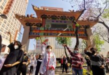 People perform a Taichi class in Plaza Santos Degollados, in the Center, as part of the outdoor activities that have been organized for the arrival of spring