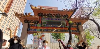 People perform a Taichi class in Plaza Santos Degollados, in the Center, as part of the outdoor activities that have been organized for the arrival of spring