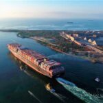 A loaded container ship leaving the port of Lazaro Cardenas in Mexico