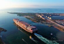 A loaded container ship leaving the port of Lazaro Cardenas in Mexico