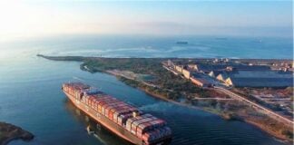 A loaded container ship leaving the port of Lazaro Cardenas in Mexico