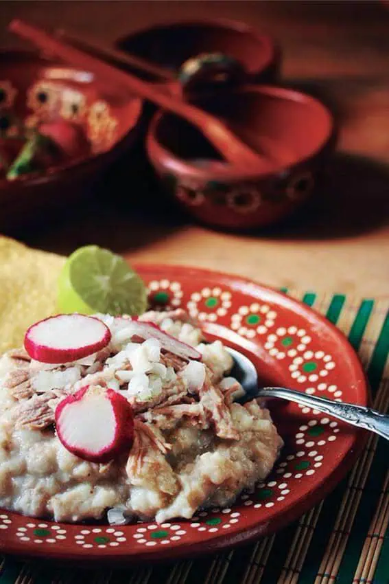 Pozole seco, one of the genius of Colima cuisine, is not served in a bowl but on a plate. 