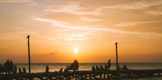 A beautiful sunset in Holbox island's wooden pier.