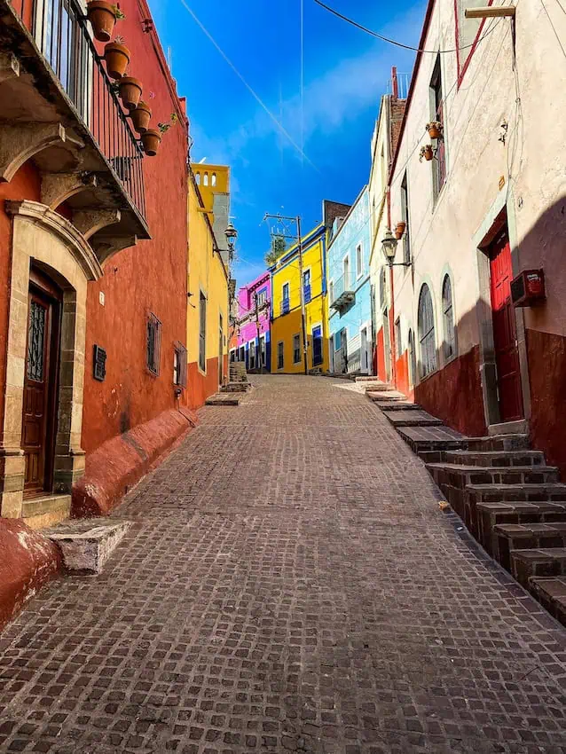 A narrow street in Guanajuato City, Guanajuato, Mexico.