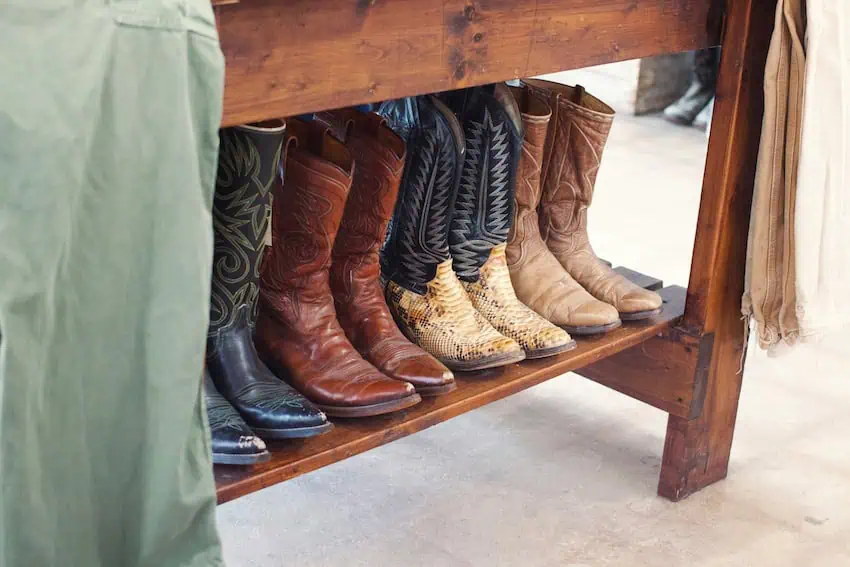 Several cowboy boots in display