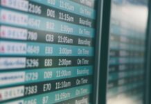 A departures board at an airport