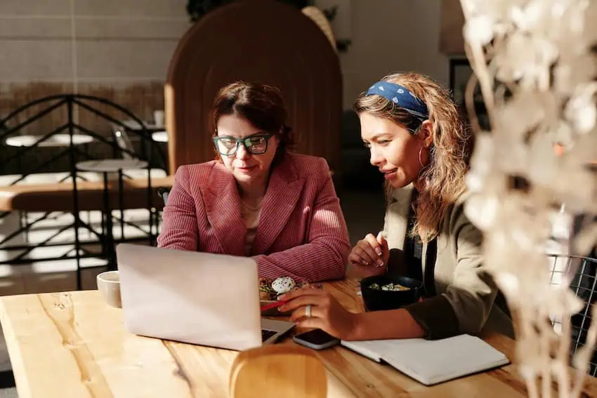 Two women working together at a local coffee shop