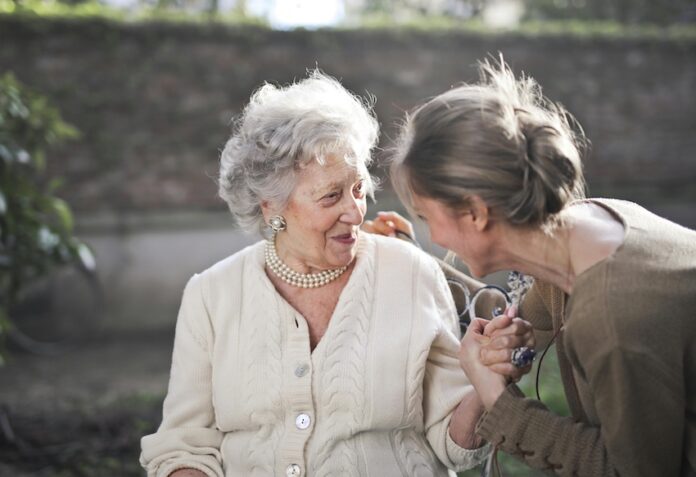 An old lady speaking to her daughter-in-law