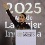 President Sheinbaum stands in front of a banner reading "2025"