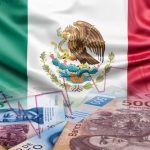 Illustrative image of a Mexican flag in the background, with Mexican peso bills in the foreground.