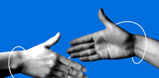 Two hands reach out for a handshake, representing a deal between Trump and Sheinbaum