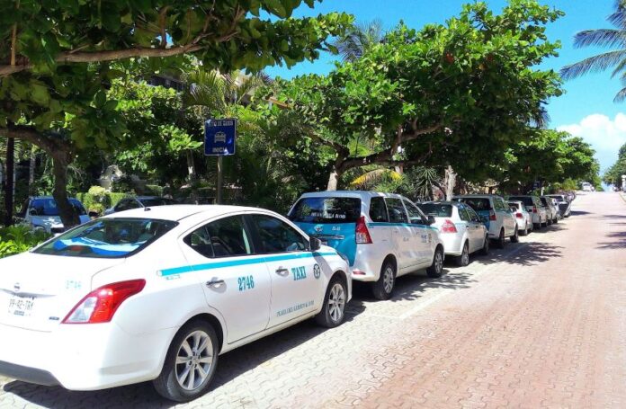 Taxis parked by the road in Quintana Roo, where the legislature has recently increased penalties for transit-related violence and extortion