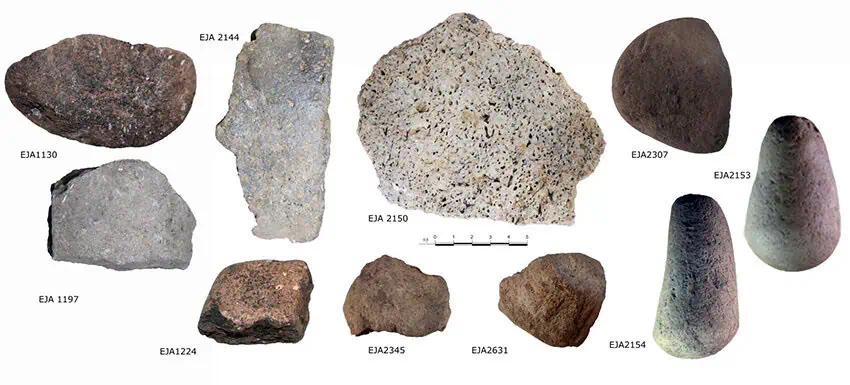 A collection of ancient grinding stones found at a Xochimilco archaeological site in Mexico City