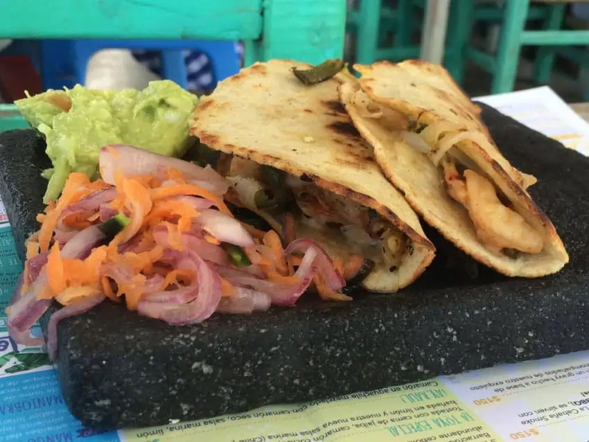 Tacos gobernador on a stone slab