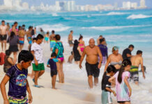 A busy day on a Cancún beach, one of the best in Mexico according to TripAdvisor