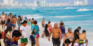 A busy day on a Cancún beach, one of the best in Mexico according to TripAdvisor