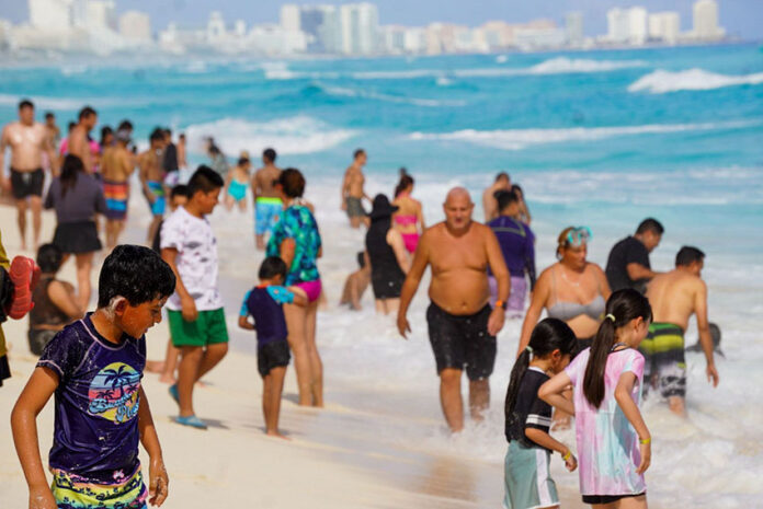 A busy day on a Cancún beach, one of the best in Mexico according to TripAdvisor