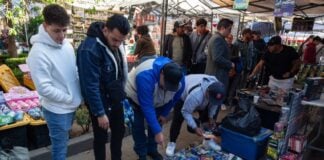 People shopping in a Mexican street.
