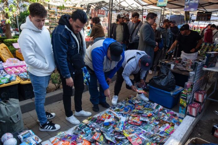 People shopping in a Mexican street.