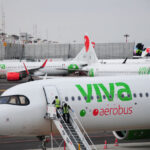 Viva Aerobus jets landed at an airport.