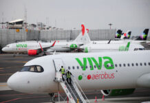 Viva Aerobus jets landed at an airport.