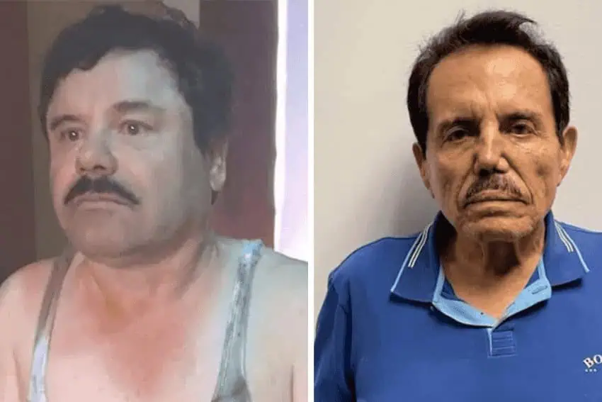 From left to right: Sinaloa Cartel founders Joaquin "El Chapo" Guzman, in a wifebeater tank top, and Ismael "El Mayo Zambada, in a blue polo shirt posing for a mugshot. Both are middle-aged-to-elderly men with mustaches and are unsmiling into the camera.