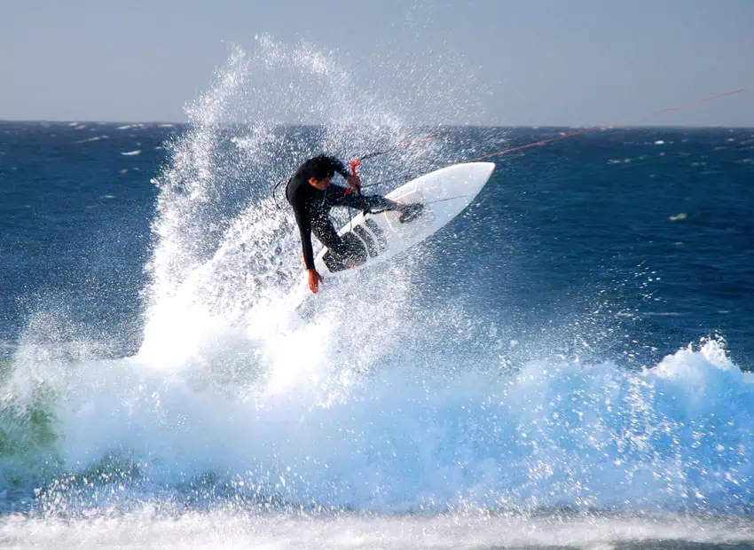 Man kitesurfing in ocean