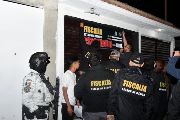 México state authorities close a barbershop in an anti-crime raid