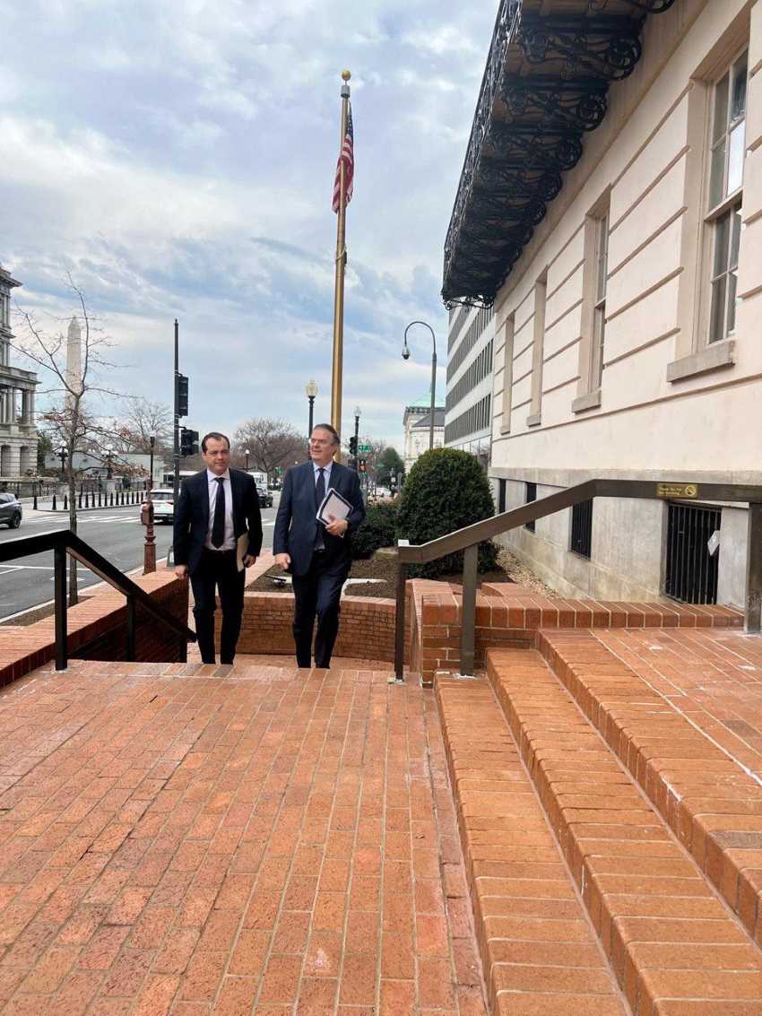 Marcelo Ebrard and US Trade Representative Jamison Greer walking up brick stairs to the U.S. Trade Representative's Offices in Washington DC.