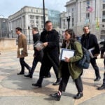 Marcelo Ebrard and other officials walk thorugh downtown Washington, D.C.