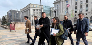 Marcelo Ebrard and other officials walk thorugh downtown Washington, D.C.