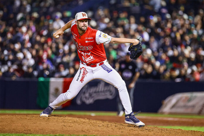 A baseball pitcher in a red Mexican uniform throws the ball at a Caribbean Series Mexico vs Dominican Republic game