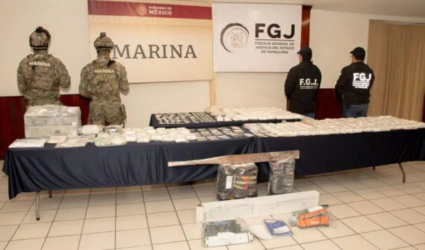 State and federal officials display confiscated drugs after a Tamaulipas cocaine bust