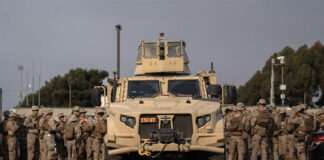 U.S. troops and a tank at a San Diego Border Patrol station in late January.