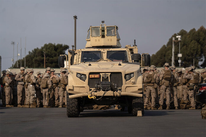 U.S. troops and a tank at a San Diego Border Patrol station in late January.