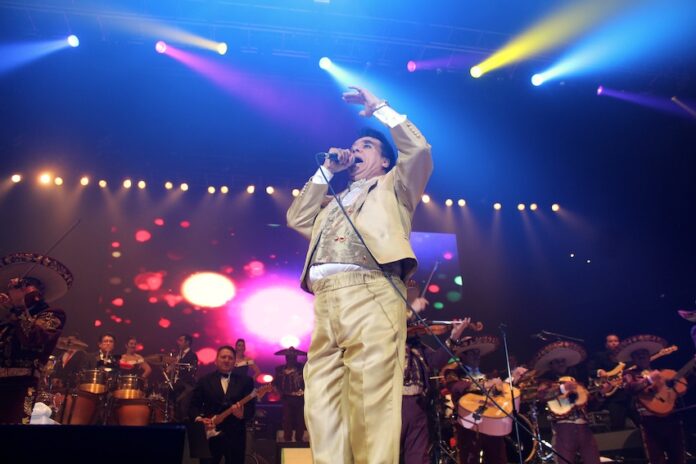 Juan Gabriel performing onstage.