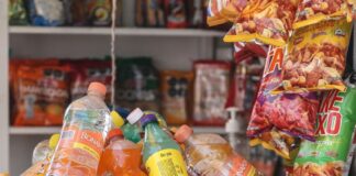 Soft drinks and chips on display in a store