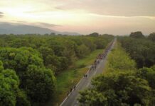 People walking along a highway in Chiapas, Mexico