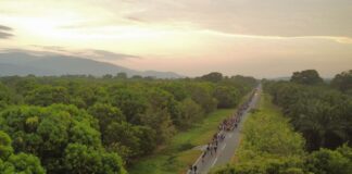 People walking along a highway in Chiapas, Mexico