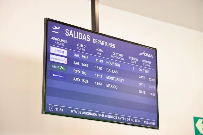 Airport departure screen showing one of the new flight destinations from SLP