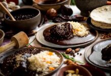 A table filled with mole dishes in Pachuca, Hidalgo.