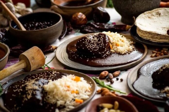 A table filled with mole dishes in Pachuca, Hidalgo.