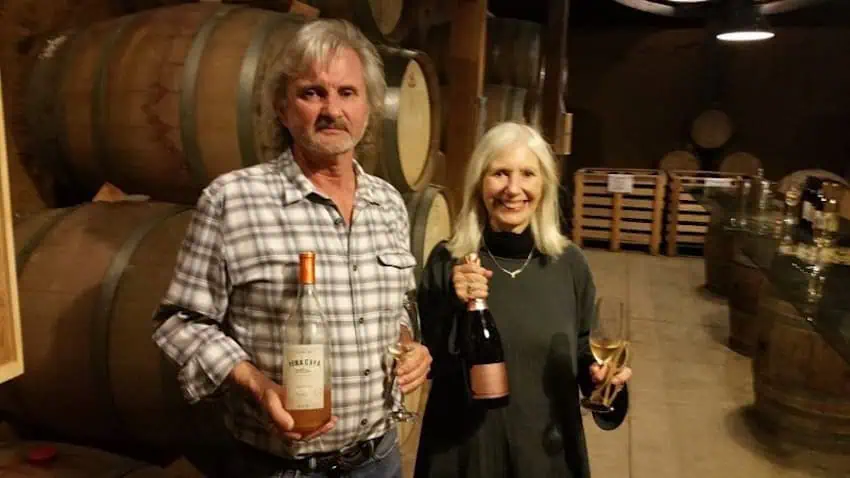 Eileen and Jim Gregory in their wine cellar.